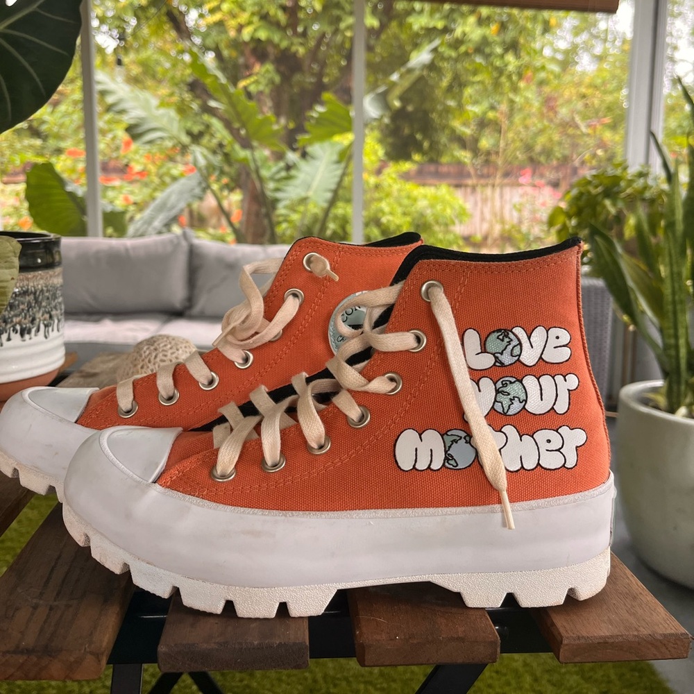 Burnt orange high top converse